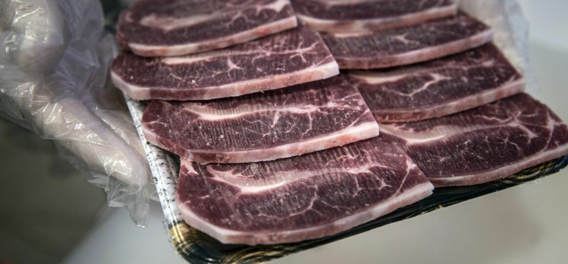 Handling of Imported Frozen Food At Ole Supermarket As Chinas Disputed Virus Theory Has Shoppers Shunning Foreign Food